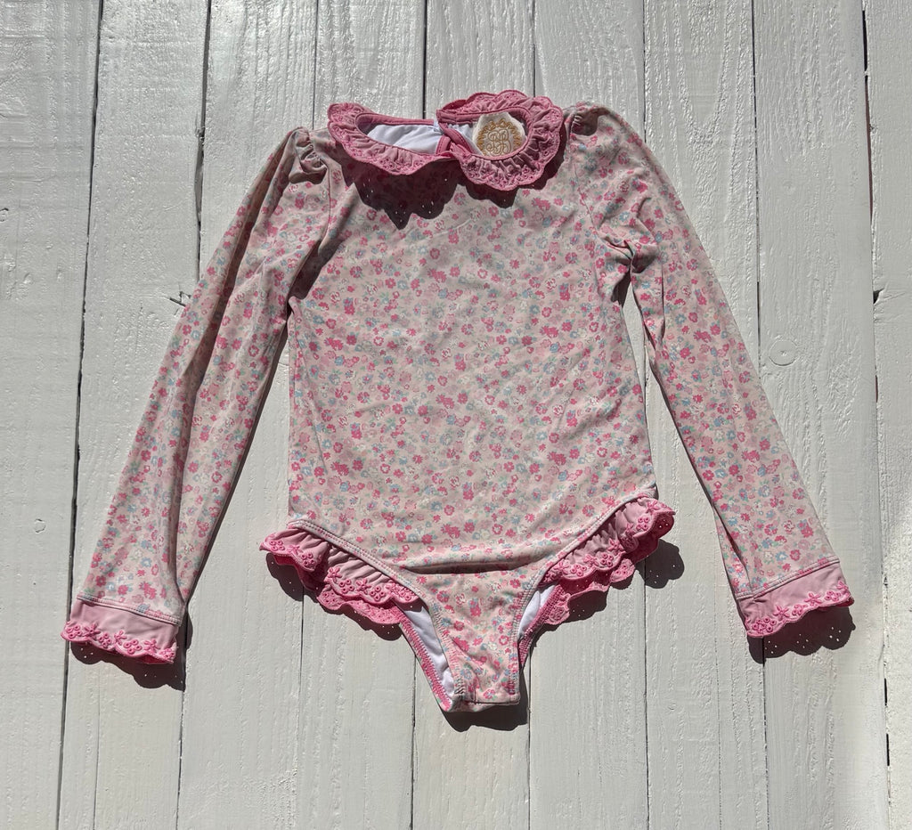 Front of The Beaufort Bonnet Company floral long sleeve swimsuit, size 5